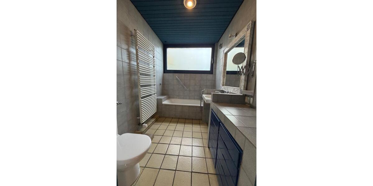 Bungalow-Einfamilienhaus in Langenberg – zeitlose Architektur zimmer