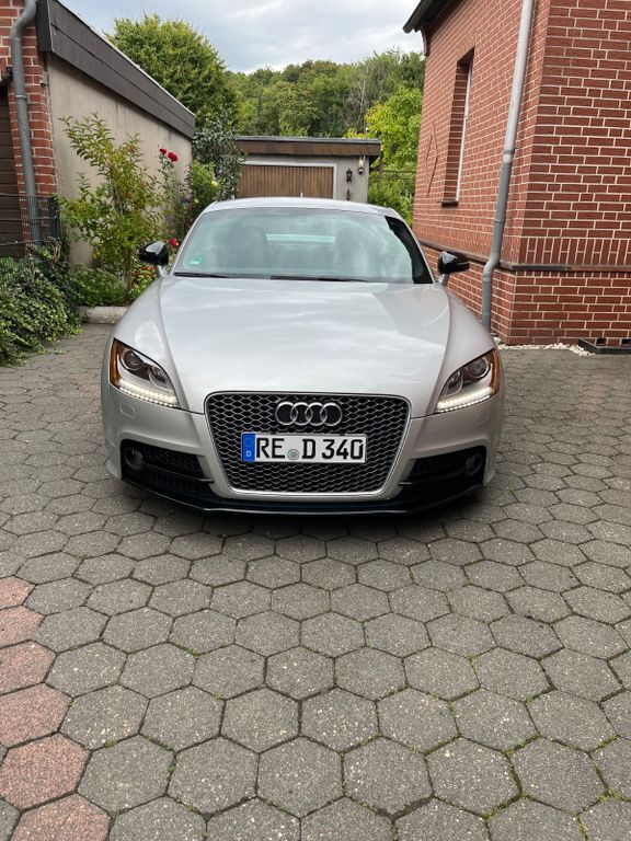 TT