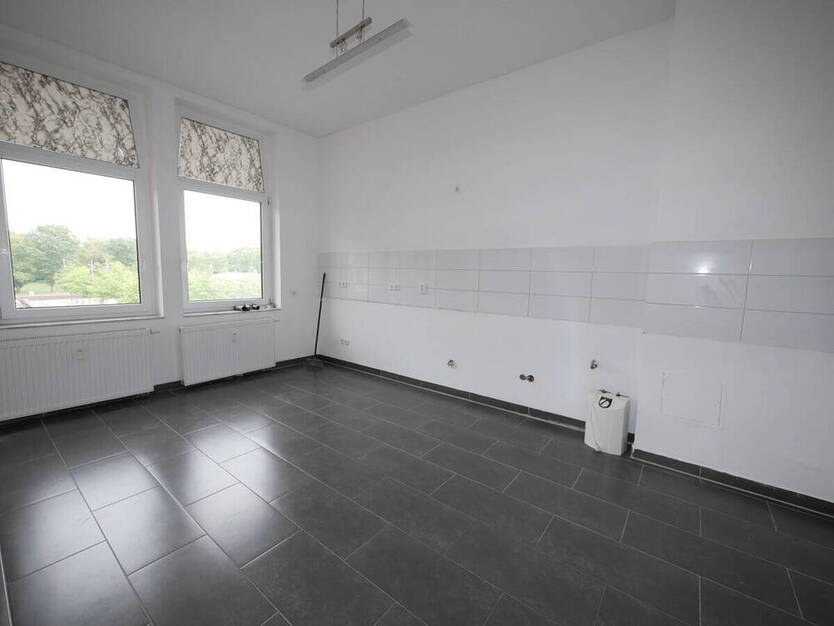 Solides Wohn- und Geschäftshaus mit 4 Wohnungen und 1 Gewerbeeinheit in Herne-Zentrum