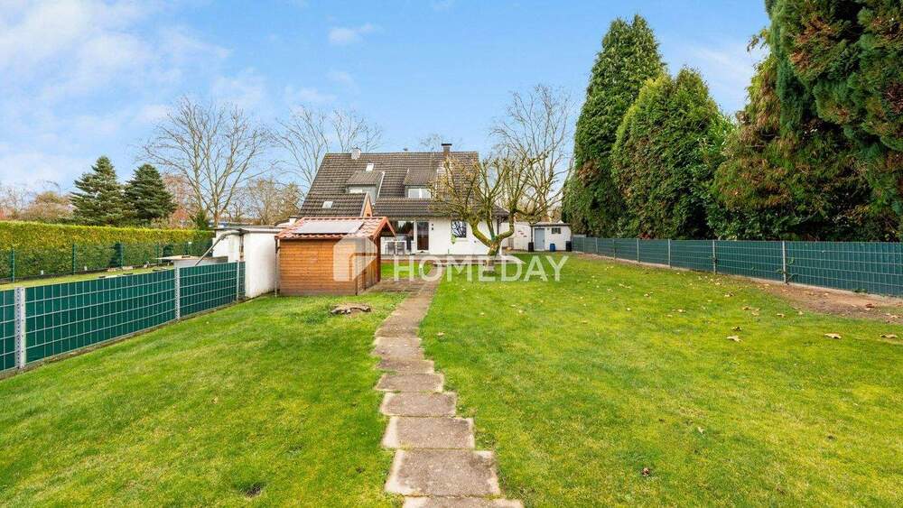 Charmante Doppelhaushälfte mit großem Grundstück und modernem Wohnkomfort 6 zimmer