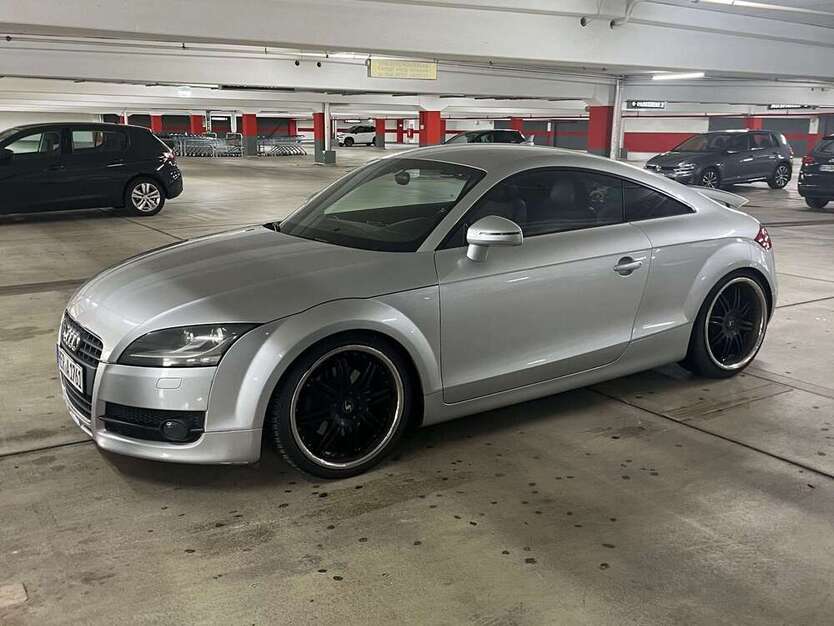 TT