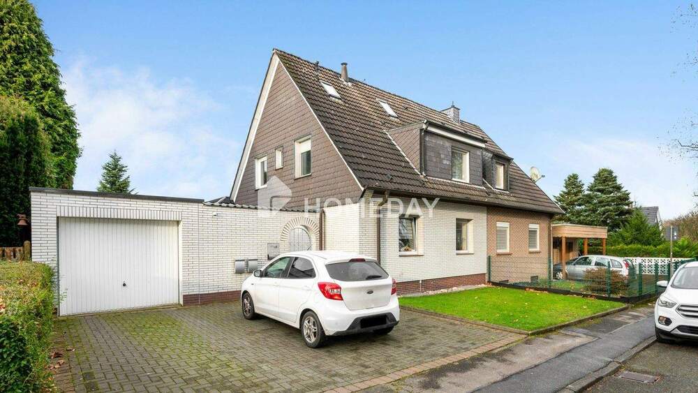 Charmante Doppelhaushälfte mit großem Grundstück und modernem Wohnkomfort 6 zimmer