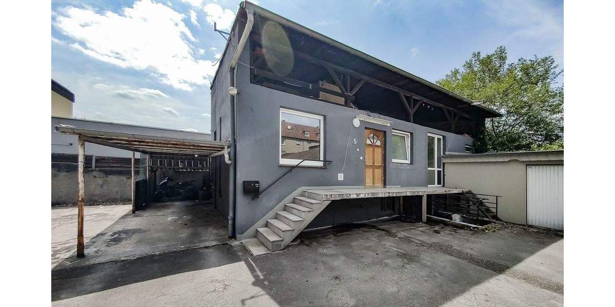 6 Wohnungen - 10 Garagen - 4 Stellplätze - 5 Balkone 2 zimmer