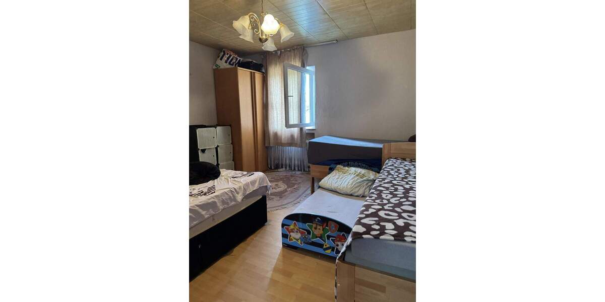 2 Eigentumswohnungen mit Garagen und Garten 5 zimmer