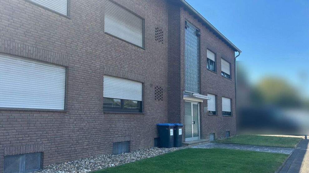 Kapellen: Voll vermietetes Sechs-Familienhaus mit zwei Garagen zimmer